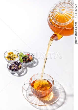 Beautiful herbal tea Beauty and health, herb tea Beautiful herbal tea Beauty and health, herb tea 65316974