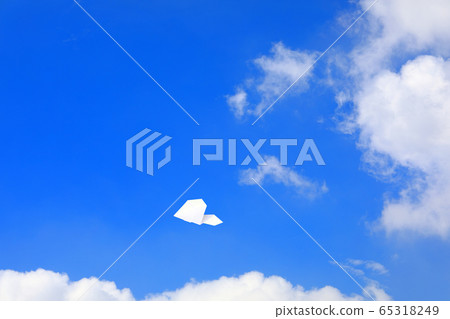 Paper airplane flying in the sky 65318249