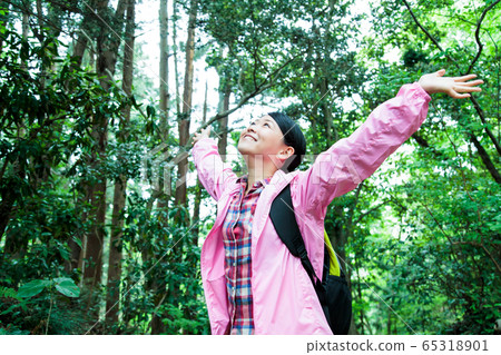 Mountaineering women mountain girl trekking mountain climbing outdoor hiking Mountaineering women mountain girl trekking mountain climbing outdoor hiking 65318901