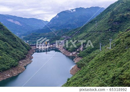 Dam wall and surrounding landscape at Wulong Dam in Chongqing, China. Dam wall and surrounding landscape at Wulong Dam in Chongqing, China. 65318992