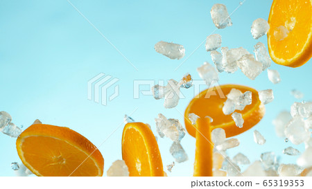 Freeze Motion of flying orange slices with ice Freeze Motion of flying orange slices with ice 65319353