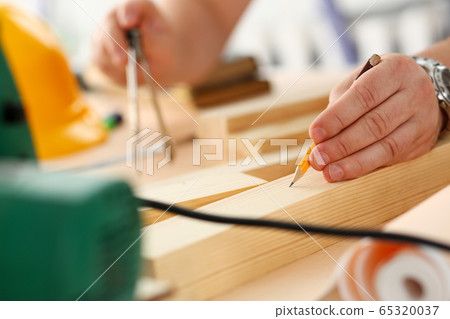 Arms of worker making structure plan Arms of worker making structure plan 65320037