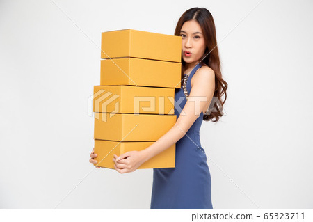 Happy Asian woman holding package parcel box, 65323711