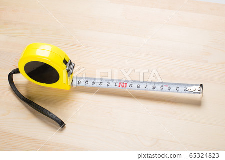 Measure on wooden board 65324823