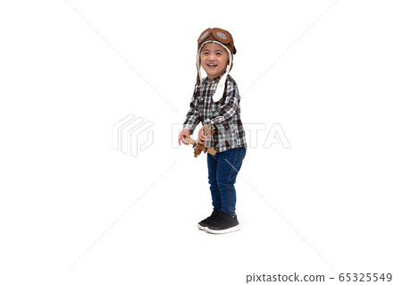 Happy kid Asian boy playing with toy airplane 65325549
