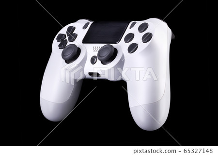 White video game joystick gamepad isolated on a black background 65327148