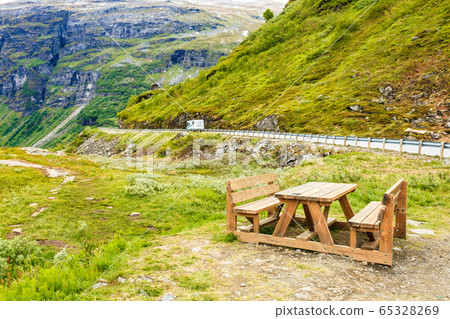Camp site with picnic table in norwegian mountains Camp site with picnic table in norwegian mountains 65328269