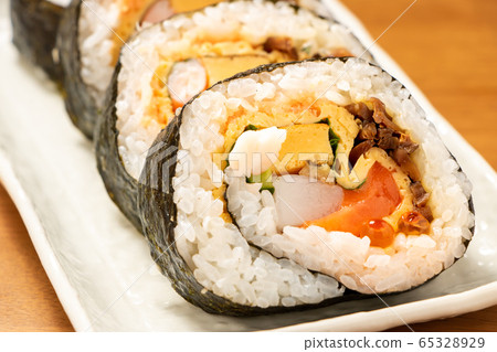 Seafood thick roll sushi. Seafood thick roll sushi. 65328929