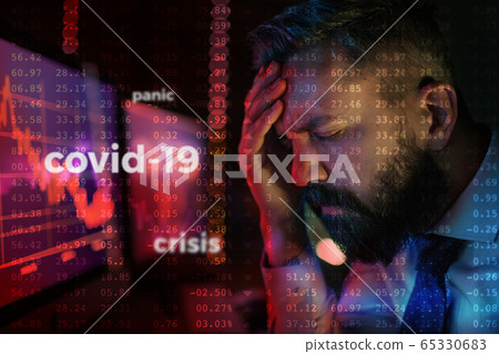 Frustrated businessman with computer sitting at desk, financial crisis and corona virus concept. Frustrated businessman with computer sitting at desk, financial crisis and corona virus concept. 65330683