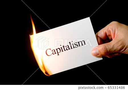 Hand with a card written Burned Capitalism Hand with a card written Burned Capitalism 65331486