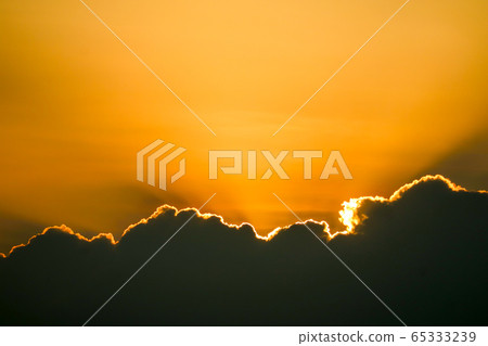 sunset sky back on dark silhouette cloud and 65333239