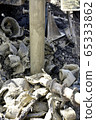 Construction machine for drilling holes in the 65333862
