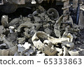 Construction machine for drilling holes in the 65333863