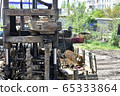 Construction machine for drilling holes in the 65333864