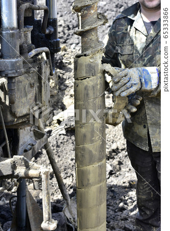 Drilling machine for drilling holes in the ground 65333866