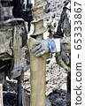 Drilling machine for drilling holes in the ground 65333867