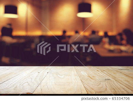 wood table on blur of cafe, coffee shop, bar, 65334706
