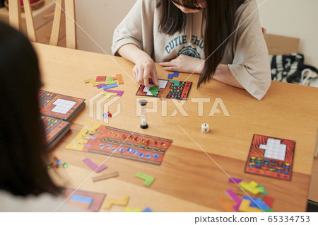Family playing board games Family playing board games 65334753