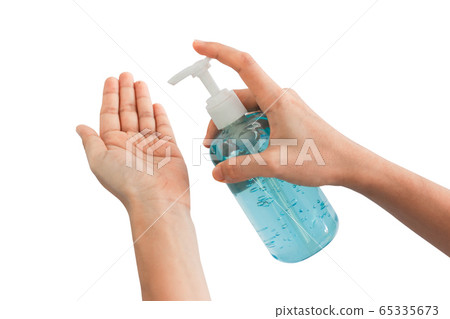 Washing hands with alcohol gel. Sanitizer after using a public restroom. Hygiene concept. Prevent the spread of germs and hand hygiene corona virus protection. 65335673