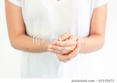 Washing hands with alcohol gel. Sanitizer after using a public restroom. Hygiene concept. Prevent the spread of germs and hand hygiene corona virus protection. Washing hands with alcohol gel. Sanitizer after using a public restroom. Hygiene concept. Prevent the spread of germs and hand hygiene corona virus protection. 65335675