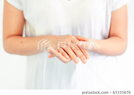 Washing hands with alcohol gel. Sanitizer after using a public restroom. Hygiene concept. Prevent the spread of germs and hand hygiene corona virus protection. Washing hands with alcohol gel. Sanitizer after using a public restroom. Hygiene concept. Prevent the spread of germs and hand hygiene corona virus protection. 65335676