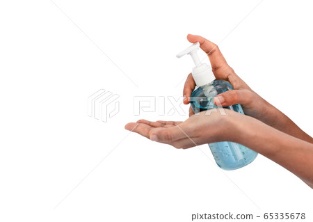 Washing hands with alcohol gel. Sanitizer after using a public restroom. Hygiene concept. Prevent the spread of germs and hand hygiene corona virus protection. Washing hands with alcohol gel. Sanitizer after using a public restroom. Hygiene concept. Prevent the spread of germs and hand hygiene corona virus protection. 65335678
