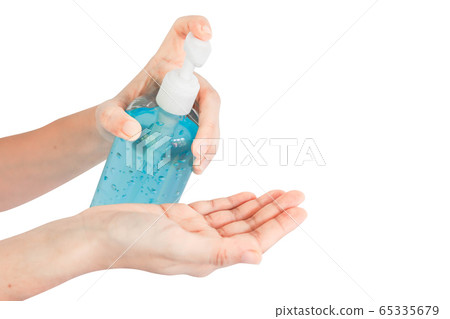 Washing hands with alcohol gel. Sanitizer after using a public restroom. Hygiene concept. Prevent the spread of germs and hand hygiene corona virus protection. 65335679