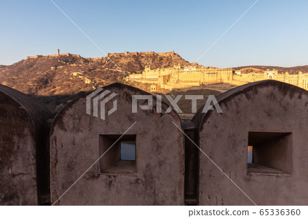 Walls of Amer and Amber Fort view, India, Jaipur Walls of Amer and Amber Fort view, India, Jaipur 65336360