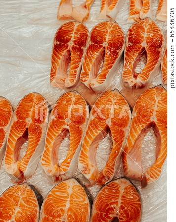 lots of red fish steaks for cooking a background 65336705