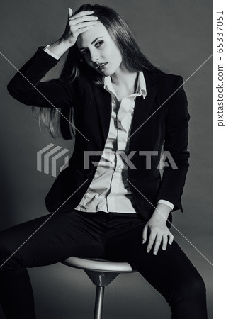girl posing in the Studio on a Chair girl posing in the Studio on a Chair 65337051