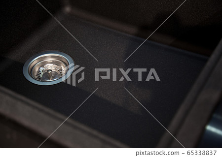 Interior of modern kitchen and acrylic sink drain 65338837