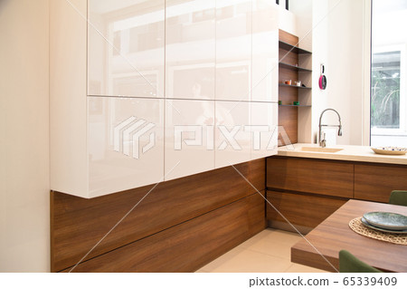 Modern kitchen, wooden walnut dining table and 65339409