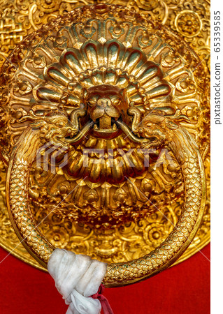 Lion shaped door handle in Buddhist temple Lion shaped door handle in Buddhist temple 65339585