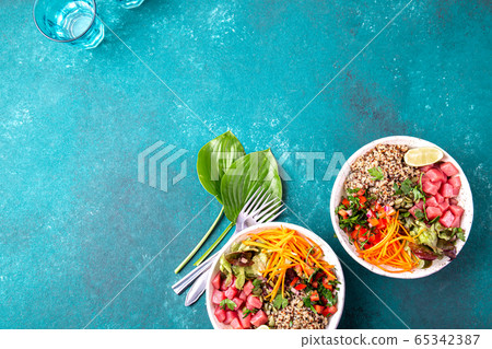 Vercion of Hawaiian tuna poke bowl with quinoa. Vercion of Hawaiian tuna poke bowl with quinoa. 65342387