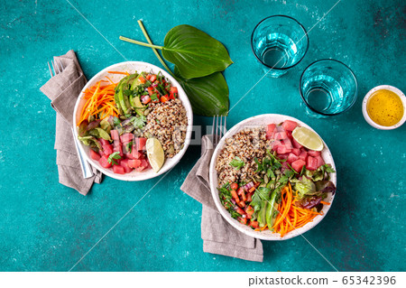 Vercion of Hawaiian tuna poke bowl with quinoa. 65342396