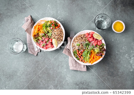 Tuna poke bowl with quinoa and vegetales. budda 65342399