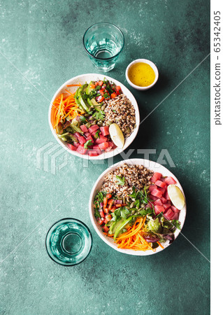 Vercion of Hawaiian tuna poke bowl with quinoa. 65342405