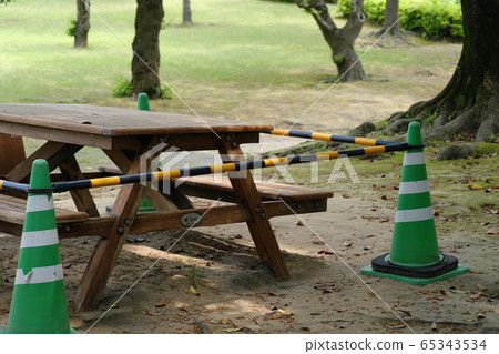 Bench stand under inspection in the park Bench stand under inspection in the park 65343534