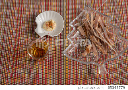 Whiskey straight and squid Whiskey straight and squid 65343779