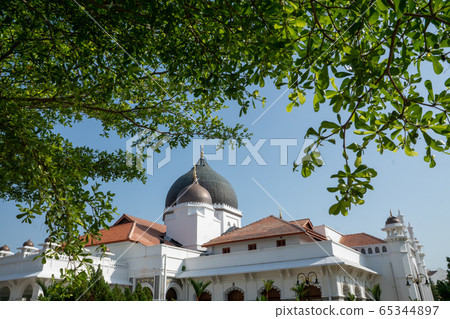 Kapitan Keling Mosque with foreground leaves. Kapitan Keling Mosque with foreground leaves. 65344897