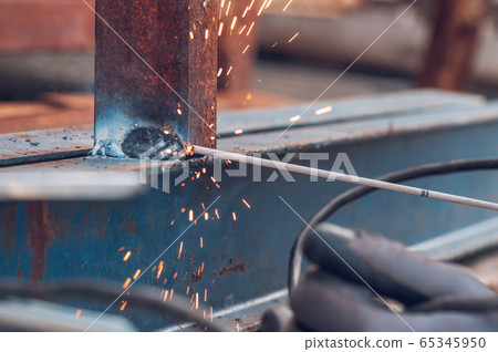 Close up Welding sparks light, industrial background. Close up Welding sparks light, industrial background. 65345950