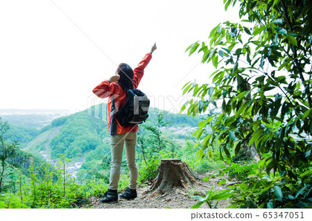 Girl hiking a mountain stock photo (116805) - YouWorkForThem