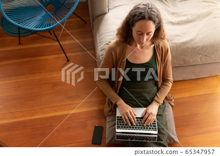 Caucasian woman spending time at home self isolating and social distancing in quarantine lockdown du Caucasian woman spending time at home self isolating and social distancing in quarantine lockdown du 65347957