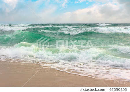 storm on the sandy beach. dramatic ocean scenery storm on the sandy beach. dramatic ocean scenery 65350893