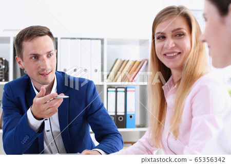 Group of people sit in office deliberate on problem Group of people sit in office deliberate on problem 65356342