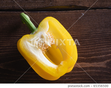 Cross section of fresh yellow paprika. Cross section of fresh yellow paprika. 65356500