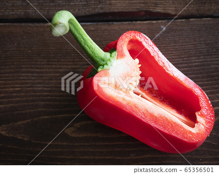 Cross section of fresh red paprika. Cross section of fresh red paprika. 65356501