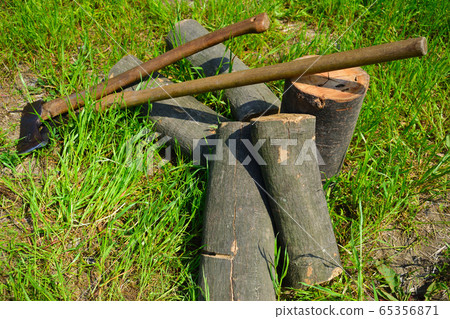 Chopping wood and ax 65356871
