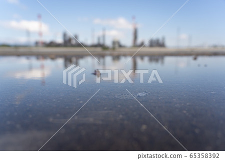 Yokkaichi factory and puddle 65358392