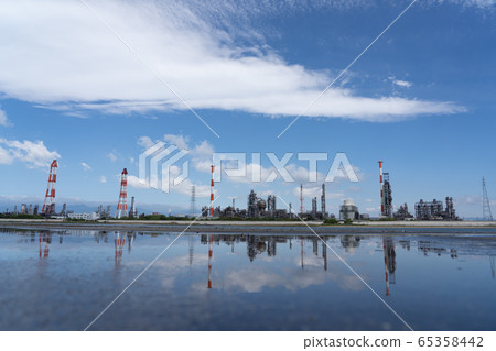 Yokkaichi factory and puddle Yokkaichi factory and puddle 65358442